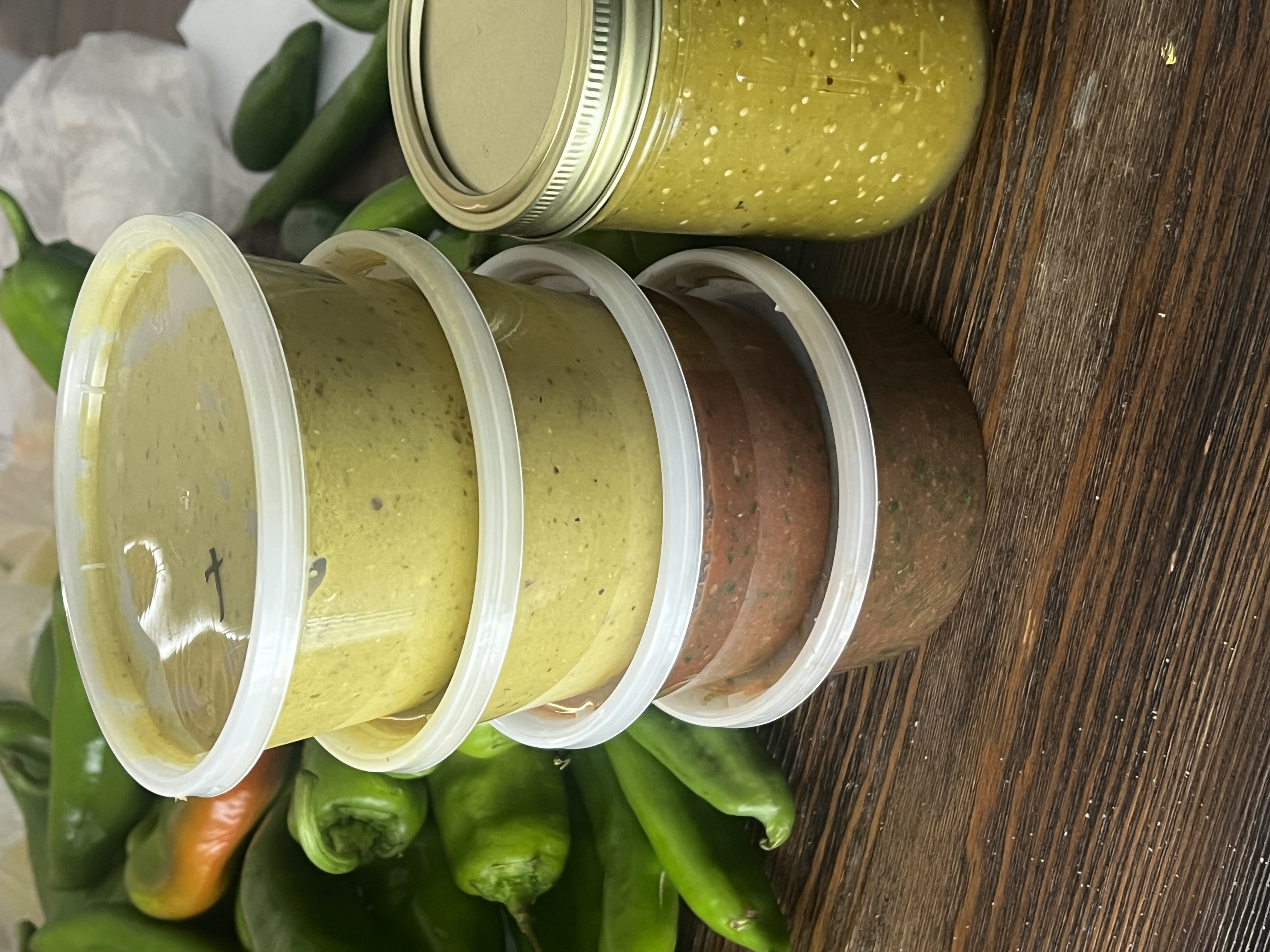 Fresh SOSS tubs stacked with green peppers
